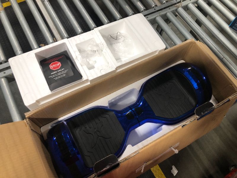 Photo 1 of ***charging adapter not inside, unable test item, sell for parts only*** Hover-1 Matrix Electric Self Balancing Hoverboard with 6.5” LED Tires, Color-Changing Fender Lights, Dual 150W Motors, 7 mph Max Speed, and 3 Miles Max Range Self Balancing Scooter