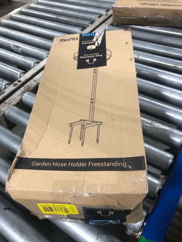 Photo 1 of Kesfitt Garden Hose Holder,Detachable Water Hose Holders Freestanding with Tool Storage Basket,4 Spikes Heavy Duty Metal Hose Stand Hanger,Garden Hose Storage Rack for Outside Lawn Yard