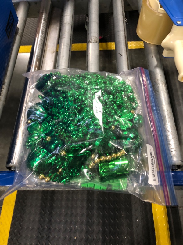 Photo 1 of 50 PCS St Patricks Day Decorations, St Patricks Day Accessories, with 9 Green Shamrock Glasses, 27 Necklaces, 24 Bracelets, St Patricks Day Favors Set for Irish Party Decor Novelty Parades Supplies
