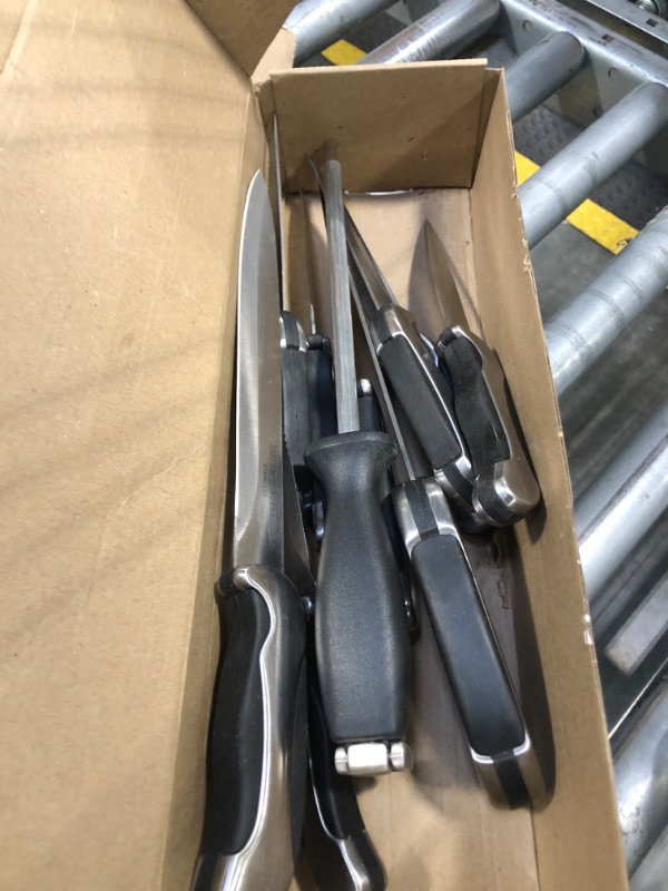Photo 1 of ***different brand***
HENCKELS Premium Quality 15-Piece Knife Set with Block, Razor-Sharp, German Engineered Knife Informed by over 100 Years of Masterful Knife Making, Lightweight and Strong, Dishwasher Safe