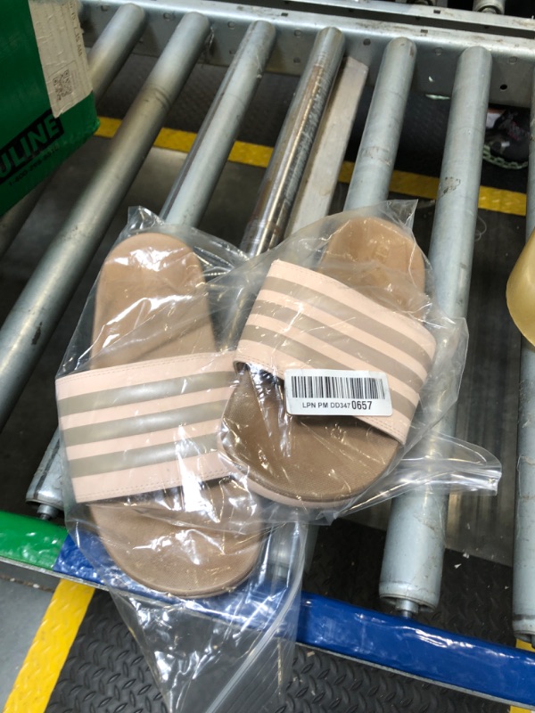 Photo 1 of ***USED*** adidas Women's Adilette Comfort Slide Sandal, Wonder Quartz/Champagne Metallic/Champagne Metallic, 6