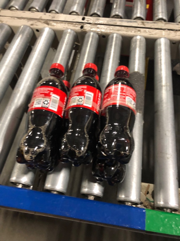 Photo 1 of  **EXPIRES 4/21/2025**
Coca-Cola, 16.9 fl oz, 6 Pack