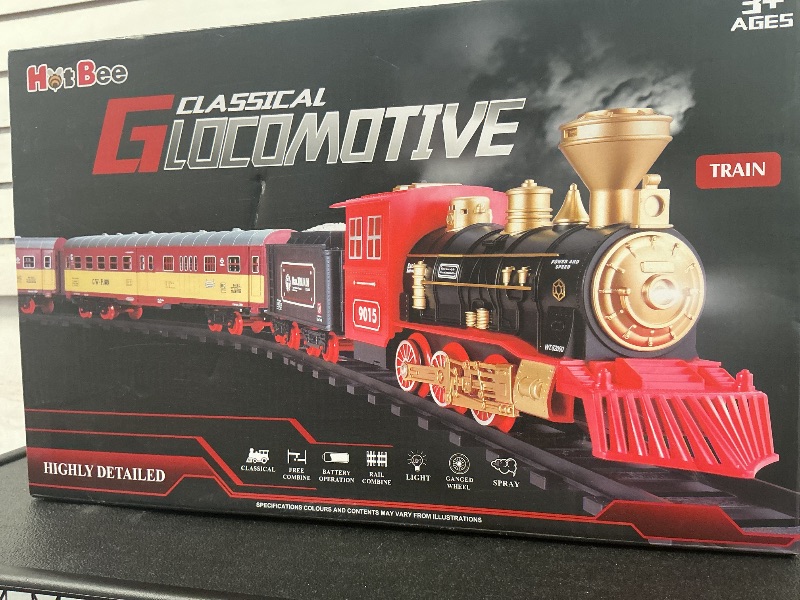 Photo 1 of Hot Bee Christmas Train Set,Train Set for Toddlers 2-4,Christmas Train Sets for Around The Tree,Steam Locomotive with Lights,Sounds,and Spray,Easy Setup Train Toy,Perfect Train Set for Kids Ages 4-8