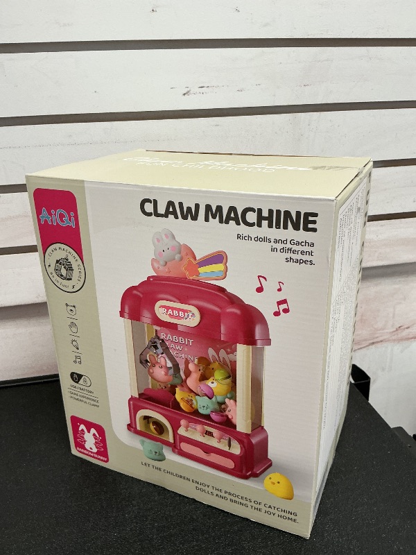 Photo 1 of Aiqi 55 PCS Large Bear Kids Claw Machine,Candy Vending Grabber,Prize Dispenser Toys for Girls and Boys,Electronic Game Machine Party Birthdays with Lights Sound,Includes 30 Toys and 25 Game Coins