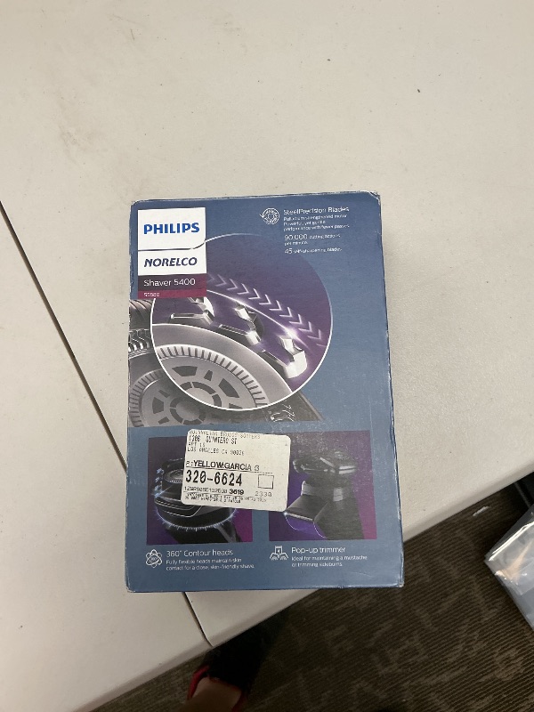 Photo 1 of Philips Norelco Shaver 5400, Rechargeable Wet & Dry Shaver with Pop-Up Trimmer, S5880/81