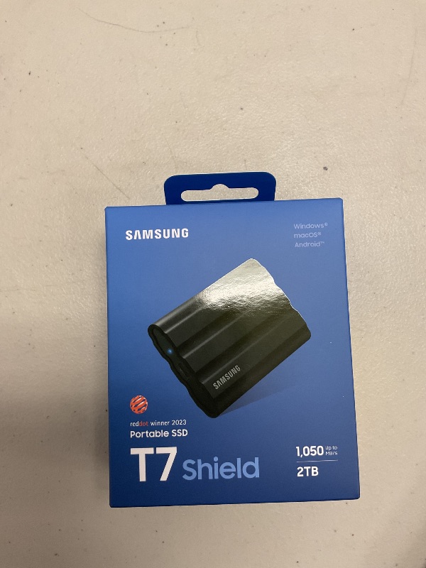 Photo 1 of Samsung T7 Shield 2TB, Portable SSD, up-to 1050MB/s, USB 3.2 Gen2, Rugged,IP65 Water & Dust Resistant, for Photographers, Content Creators and Gaming, Extenal Solid State Drive (MU-PE2T0S/AM), Black