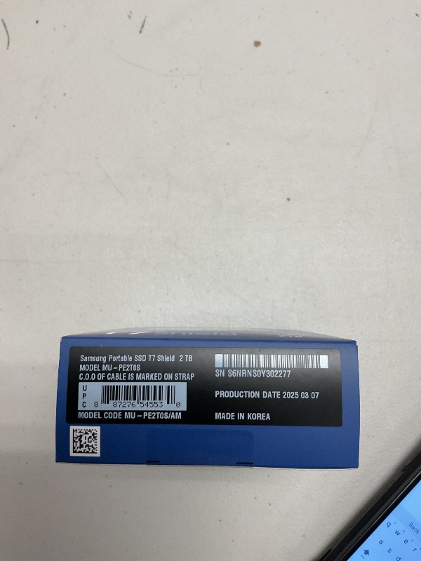 Photo 1 of Samsung T7 Shield 2TB, Portable SSD, up-to 1050MB/s, USB 3.2 Gen2, Rugged,IP65 Water & Dust Resistant, for Photographers, Content Creators and Gaming, Extenal Solid State Drive (MU-PE2T0S/AM), Black