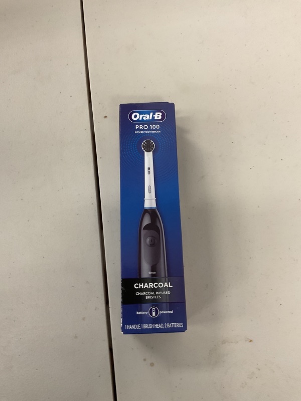 Photo 1 of Oral-B Pro 100 Charcoal, Battery Powered Electric Toothbrush, Black