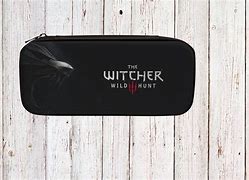 Photo 1 of the witcher wild hunt nintendo switch case
