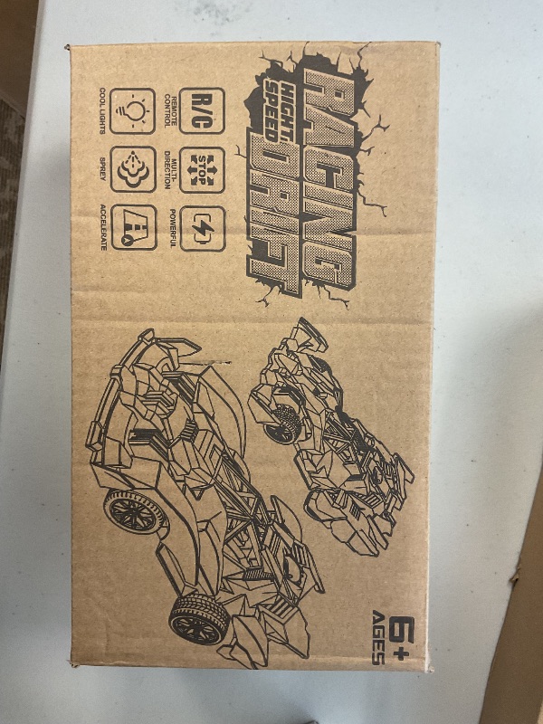 Photo 1 of UFUH 2024 Remote Control Car,RC Cars for Adults with Light Spray One-Touch Acceleration, ABS Impact Resistant RC Race Car,The Best Christmas Or Birthday Gifts for 3-16 Kids