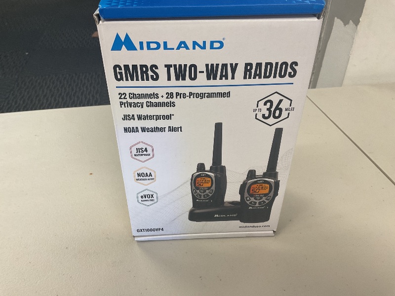 Photo 1 of Midland GXT1000VP4 Ear -Mic/Charger/2 Radios