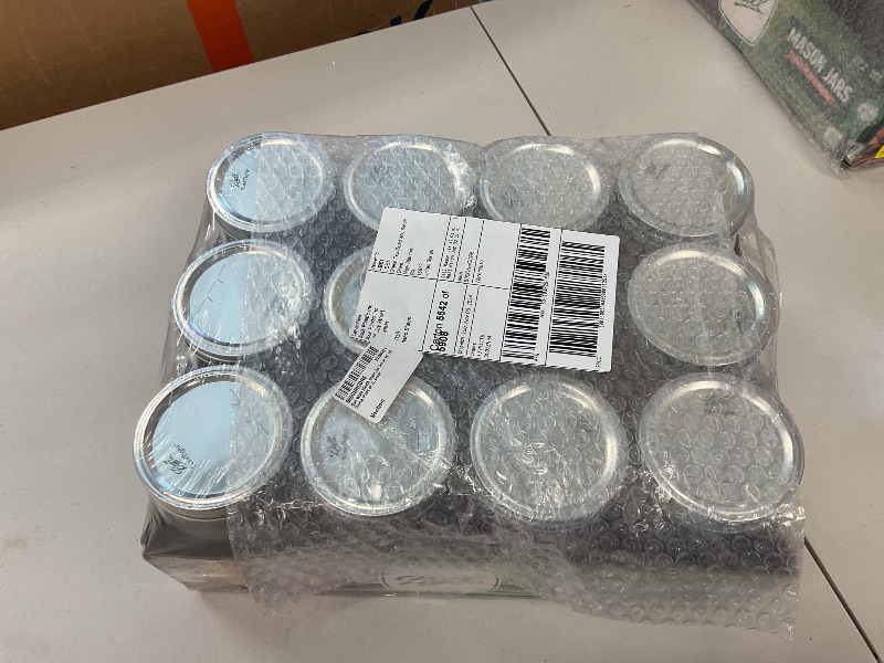 Photo 1 of Ball Wide Mouth Quart (32 oz) Jars with Lids and Bands, Set of 12