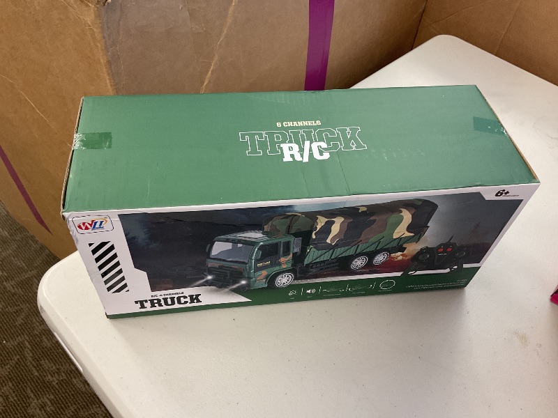 Photo 1 of VijiSuki Remote Control Military Truck,6 Channel RC Military Vehicle Toy, Army Transport Vehicle Toy,Remote Control Car 1/16 Scale Vehicle Toy for Kids Children Boy Gift