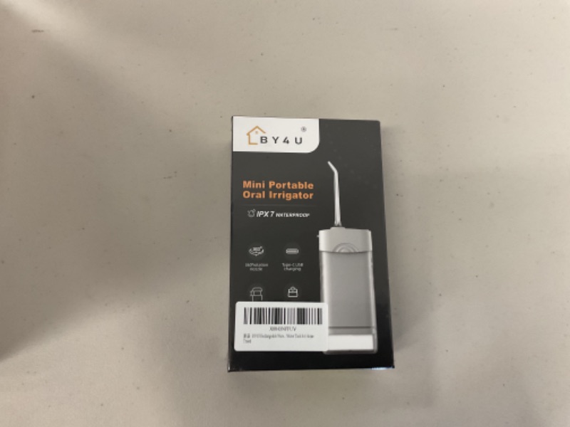 Photo 1 of BY4U Rechargeable Water Dental Flosser 200ml Mini Portable Teeth Oral Irrigator 5 Jet Tips IPX7 Waterproof with Telescopic Water Tank for Home Travel