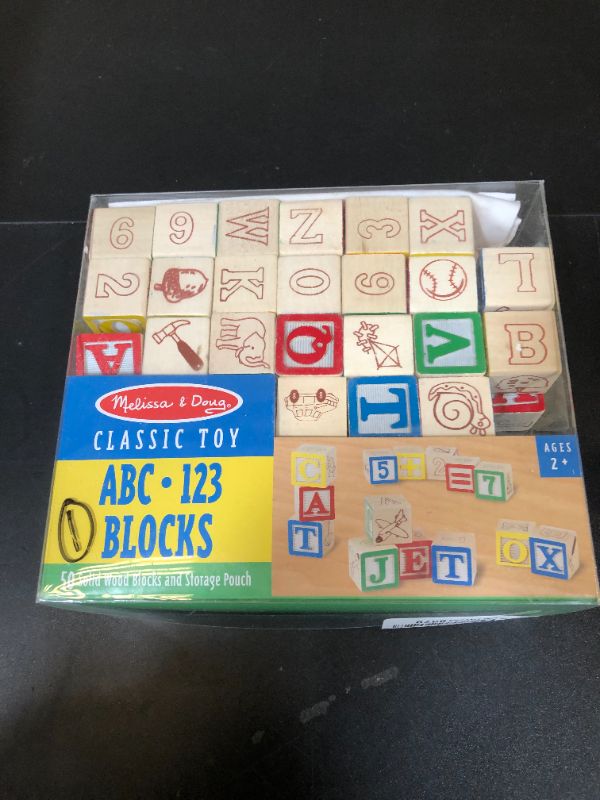 Photo 1 of Melissa & Doug Deluxe Wooden ABC/123 1-Inch Blocks Set With Storage Pouch (50 pcs), Classic Letter And Number Wooden Blocks, For Toddlers And Kids Ages 2+