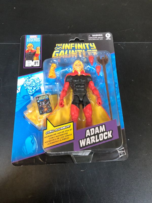 Photo 1 of Marvel Legends Series Adam Warlock, Infinity Gauntlet Comics-Inspired Collectible 6-Inch Scale Action Figure with Character-Sized Comic Accessory
