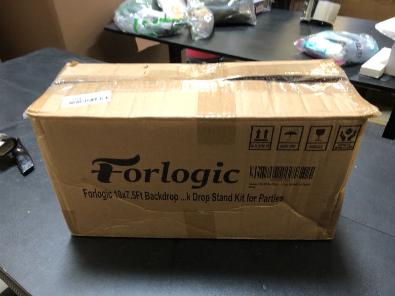 Photo 1 of Forlogic 10x7.5Ft Backdrop Stand, Heavy Duty Adjustable Photo Back Drop Stand Kit for Parties, Photography, Banner Stand (Includes Six Background Stand Clamps)