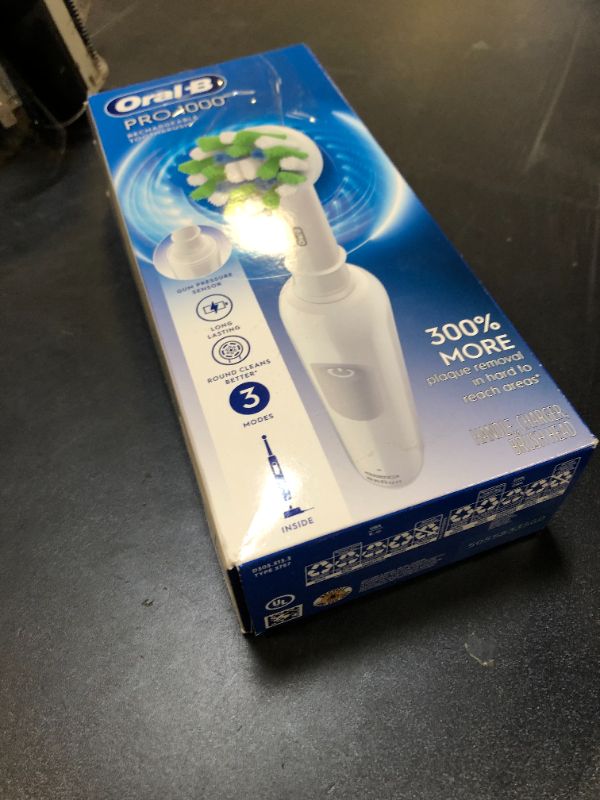 Photo 1 of Oral-B Pro 1000 Rechargeable Electric Toothbrush, White