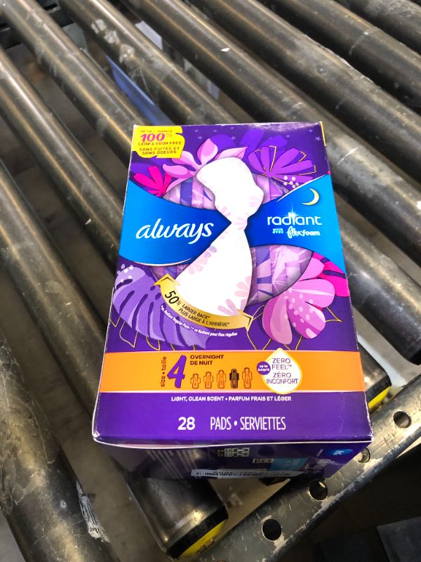 Photo 1 of Always Radiant Feminine Pads for Women, Flexfoam Pads with Wings, Size 4, Overnight Absorbency, Lightly Scented, 28 Count (Packaging May Vary)