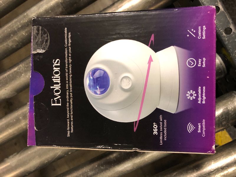 Photo 1 of BlissLights Sky Lite Evolve - Galaxy Projector, LED Nebula Lighting, WiFi App, for Meditation, Relaxation, Gaming Room, Home Theater, and Bedroom Night Light Gift (Nebula Cloud Only)
