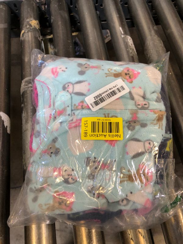 Photo 1 of Simple Joys by Carter's Baby Girls' 3-Pack Loose Fit Flame Resistant Fleece Footed Pajamas, Blue Elephant/Navy Monster/Pink Dots, 3T