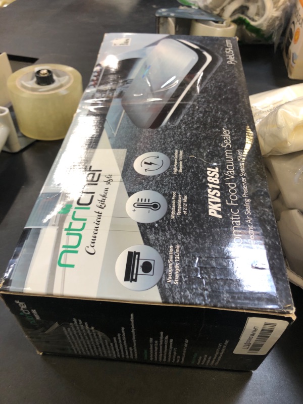 Photo 1 of NutriChef Food Vacuum Sealer Machine - Automatic Air Sealing System for Dry & Moist Foods, LED Touch Controls, Includes Vacuum Bags, Hose & Wine Stopper, High Suction Power, 14"x6"x3", Silver