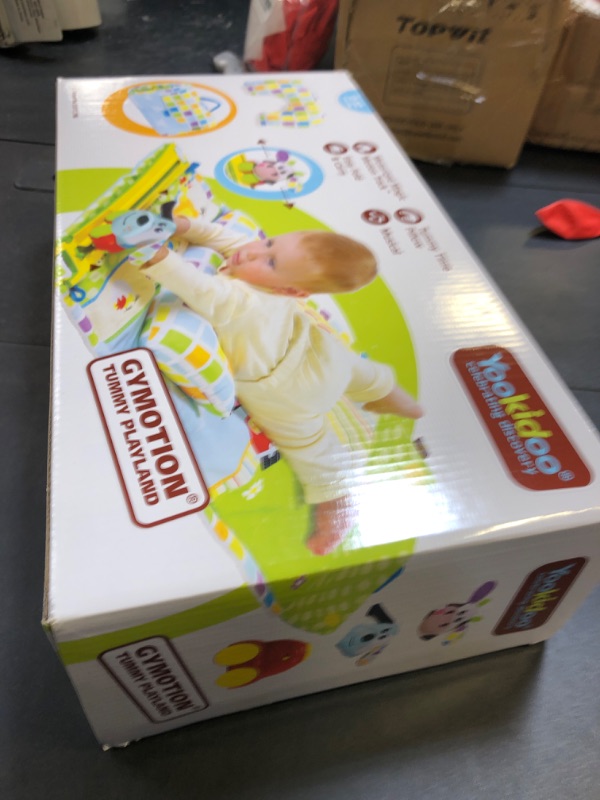 Photo 1 of Yookidoo Baby Tummy Time Mat Newborn Musical Playmat & Outdoor Gym. Pillow, Teething Toys and Portable Fold-Up Case. 0-12 Months.
