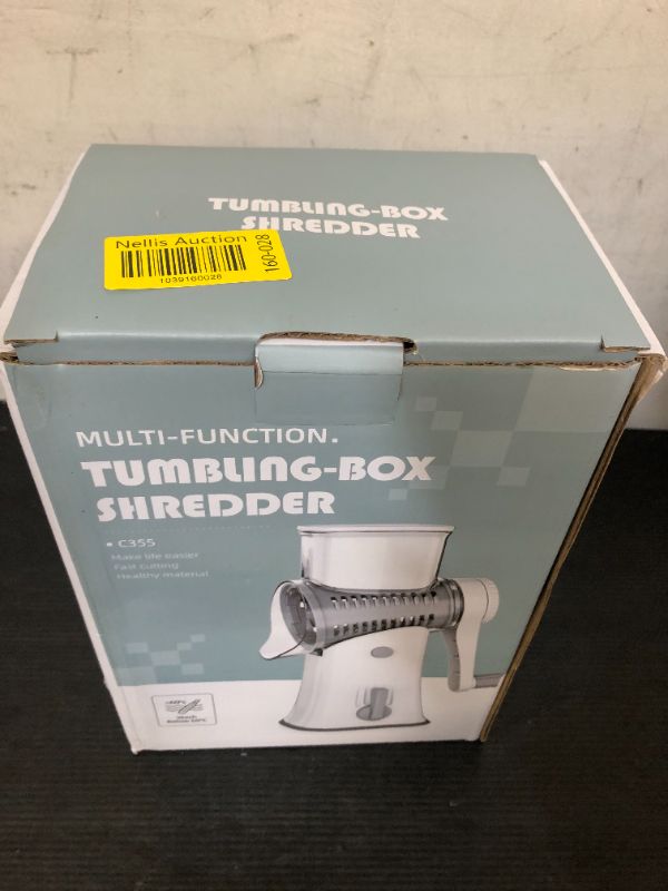 Photo 1 of YHBRAK Rotary cheese grater with 5 different interchangeable blades vegetable cheese grater slicer with handle with non-slip suction cup base for kitchen for cheese, vegetables, fruits, white