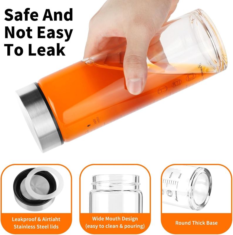 Photo 1 of Glass Juice Bottles 20 oz - Wide Mouth Glass Water Bottles with Lids 