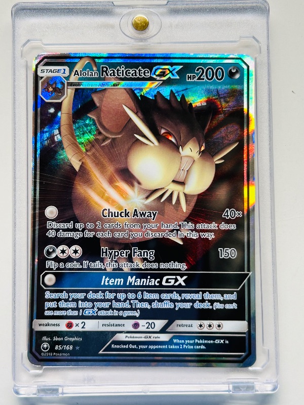 Photo 1 of 165029… Pokémon holo Alolan Raticate GX card in hard plastic case 