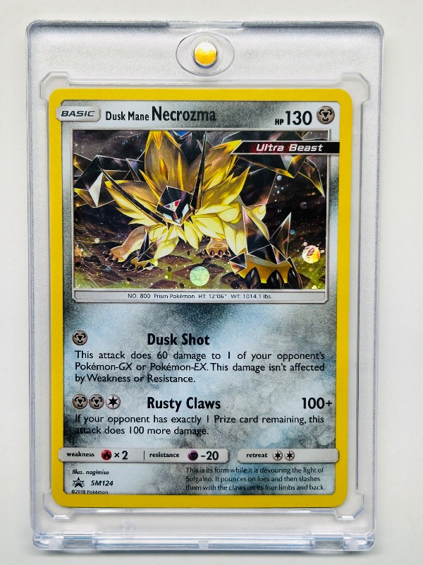Photo 1 of 165039… Pokémon holo Dusk Mane Necrozma card in hard plastic case 