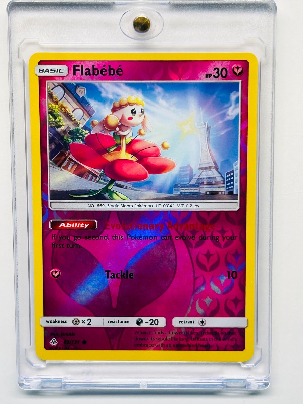 Photo 1 of 165042… Pokémon reverse holo Flabebe card in hard plastic case 