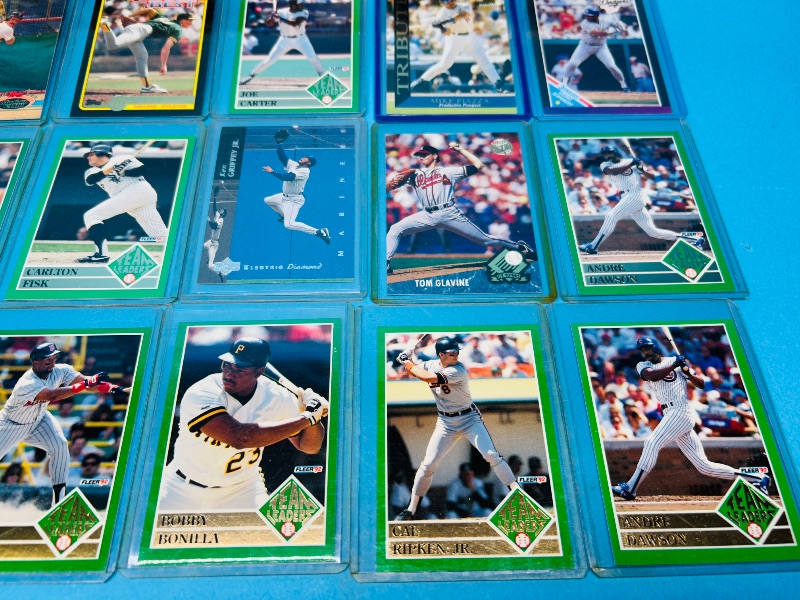 Photo 1 of 165052…24 mixed baseball cards in hard plastic sleeves 