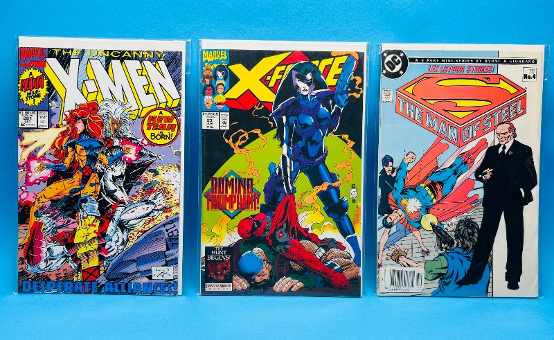 Photo 1 of 165054…3 comics in plastic sleeves 