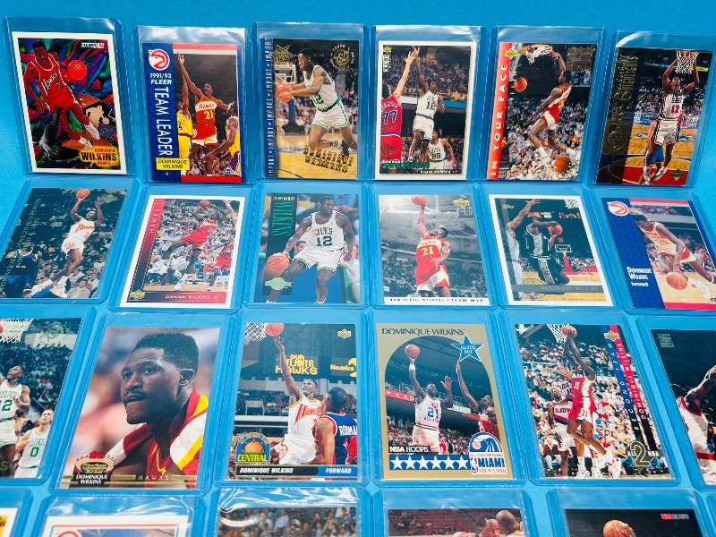Photo 1 of 165061… mixed Dominique Wilkins basketball cards in hard plastic sleeves 