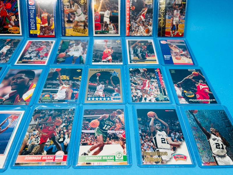 Photo 1 of 165061… mixed Dominique Wilkins basketball cards in hard plastic sleeves 