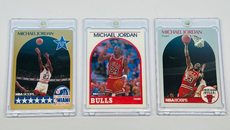 Photo 1 of 165068… 3 Michael Jordan cards in hard plastic cases