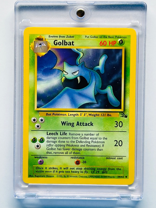 Photo 1 of 165077… Pokémon Golbat card in hard plastic case 