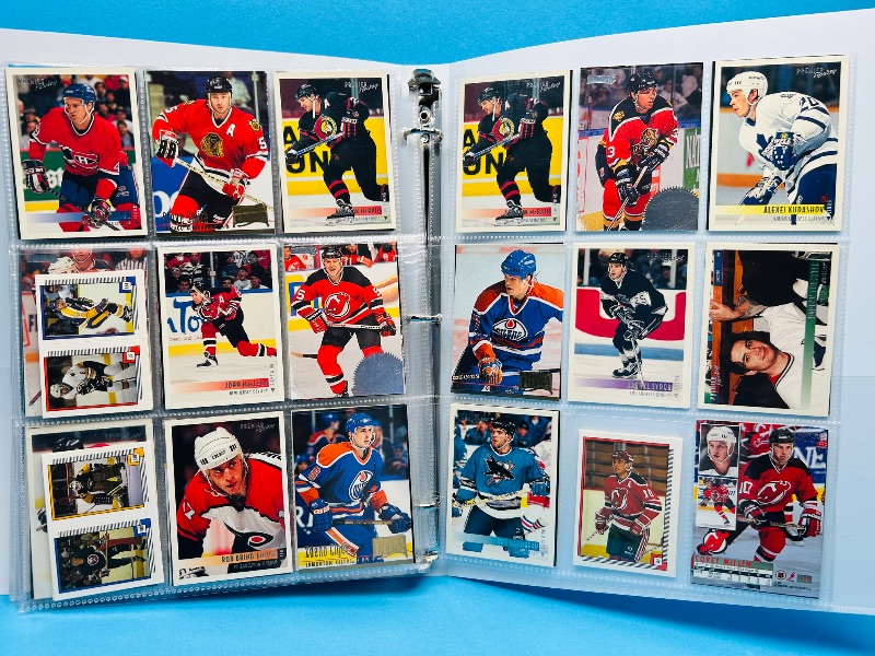 Photo 1 of 165119… final sale no returns/refunds-270 mixed hockey cards in binder