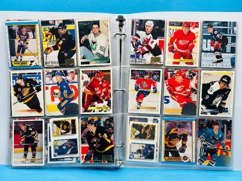 Photo 1 of 165119… final sale no returns/refunds-270 mixed hockey cards in binder