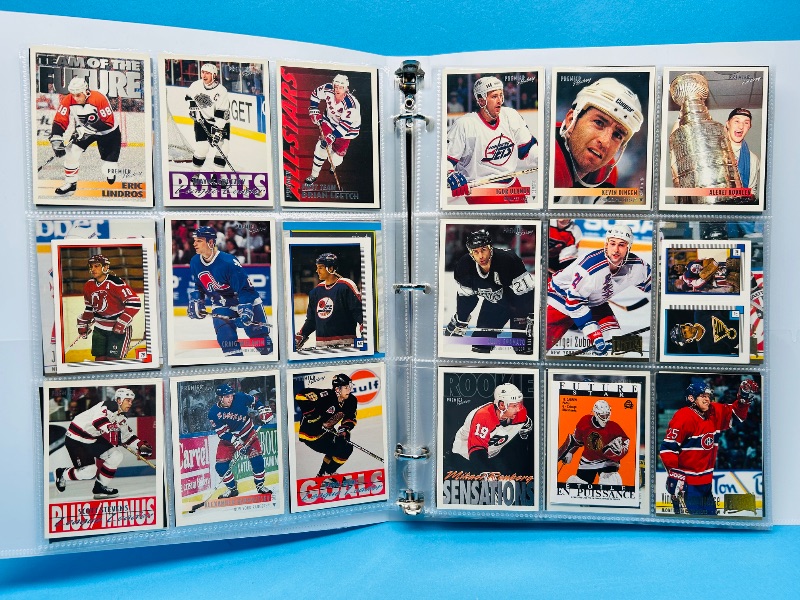 Photo 1 of 165119… final sale no returns/refunds-270 mixed hockey cards in binder
