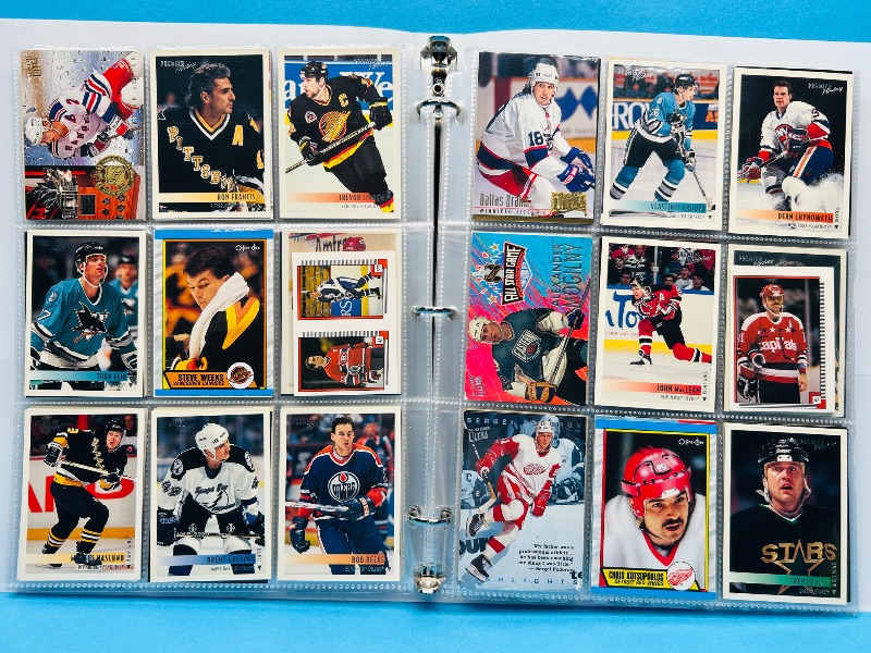 Photo 1 of 165119… final sale no returns/refunds-270 mixed hockey cards in binder