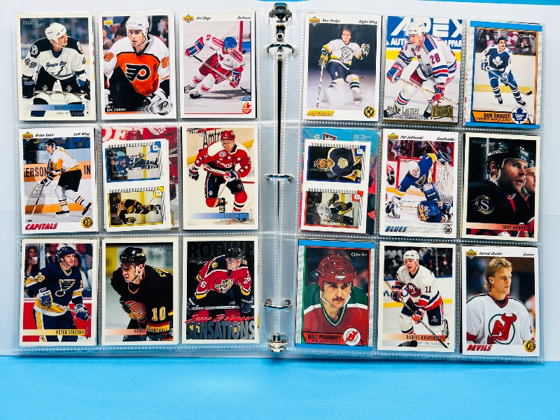 Photo 1 of 165119… final sale no returns/refunds-270 mixed hockey cards in binder