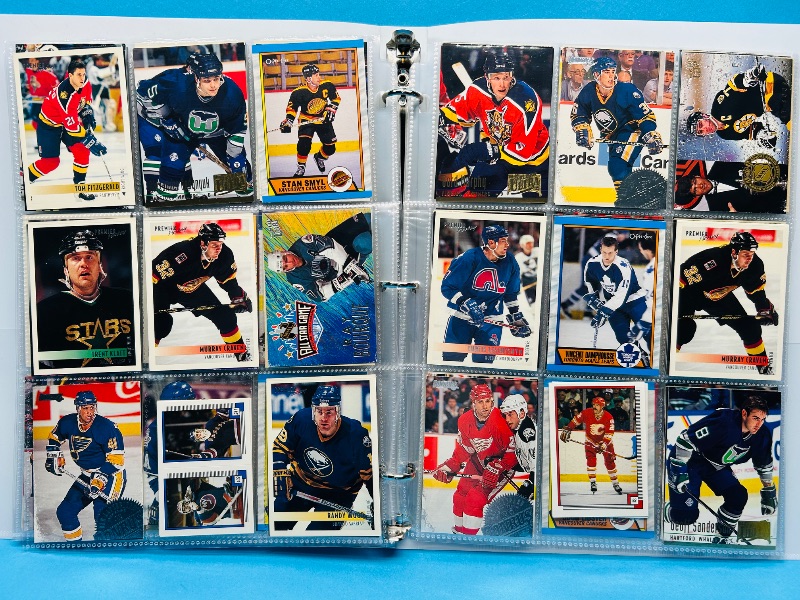 Photo 1 of 165119… final sale no returns/refunds-270 mixed hockey cards in binder
