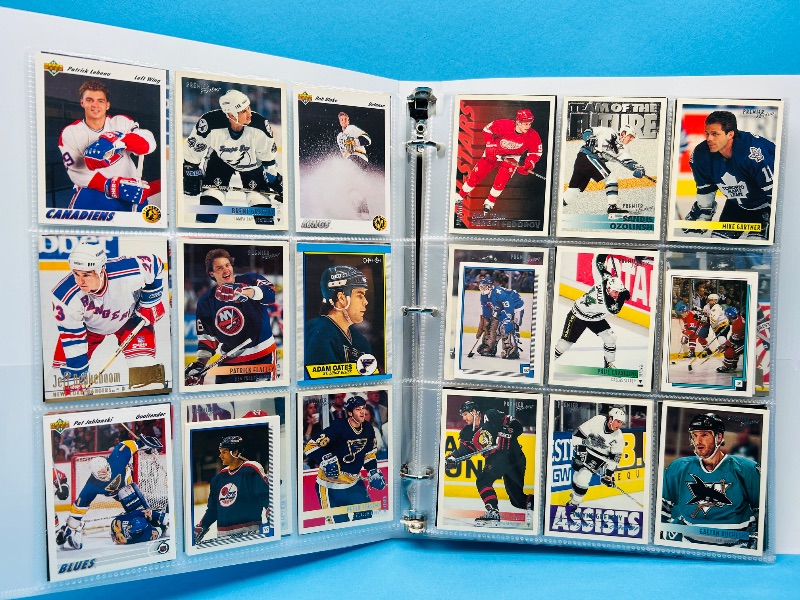 Photo 1 of 165119… final sale no returns/refunds-270 mixed hockey cards in binder