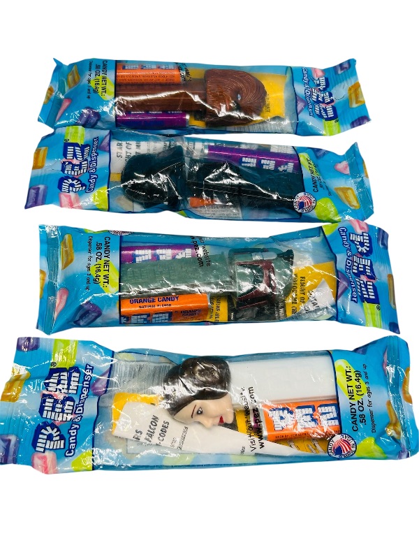 Photo 1 of 165124…4 sealed older Star Wars Pez dispensers and candy- no returns or refunds