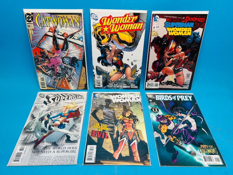 Photo 1 of 165154…6  comics in plastic sleeves 