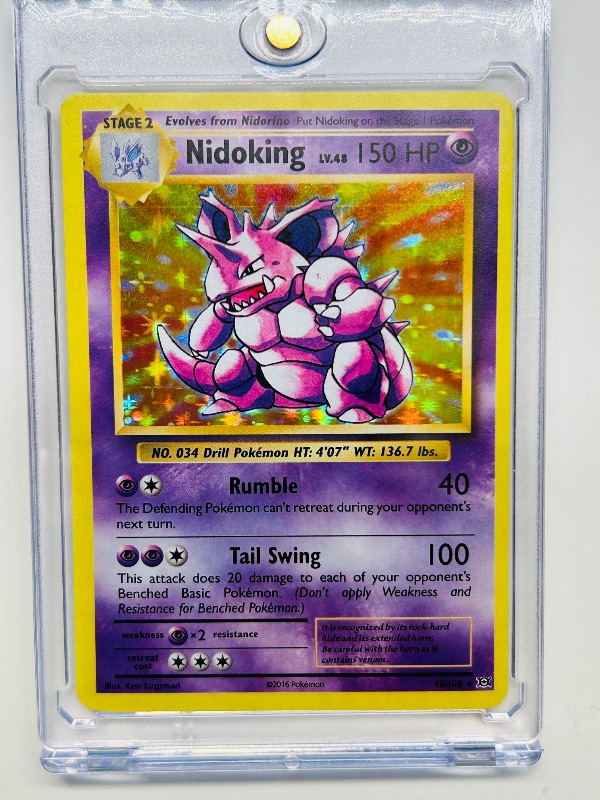 Photo 1 of 165168…Hologram Nidoking  Pokémon card in hard plastic case