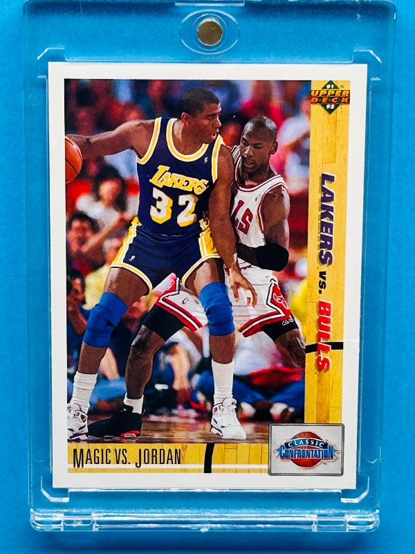 Photo 1 of 165181… Michael Jordan vs. Magic Johnson.card in hard plastic case 