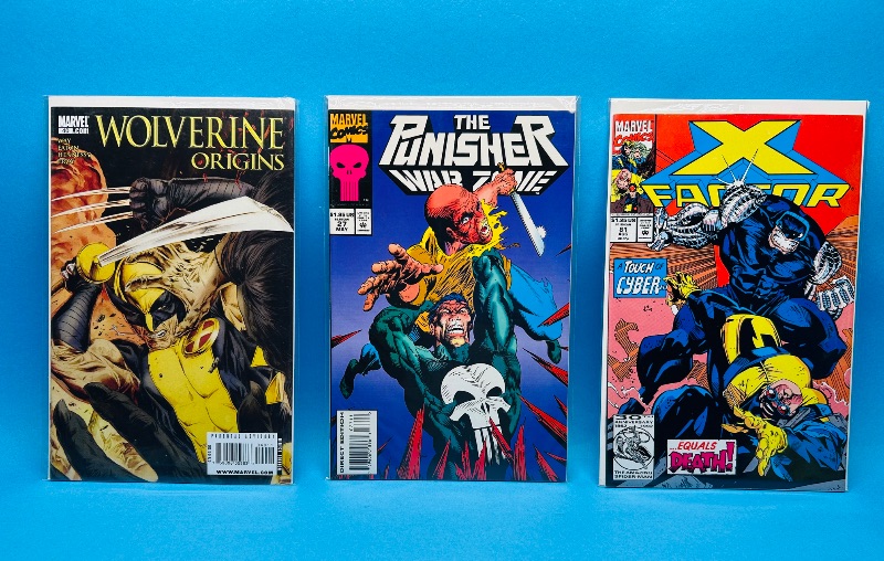 Photo 1 of 165187…3  comics in plastic sleeves 